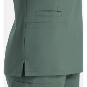 A women's double V-neck top in a soft green colour, featuring pockets and side slits for comfort. It has a logo.