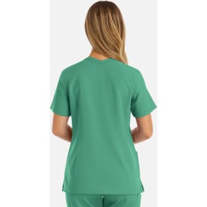A green women's double v-neck top with short sleeves, featuring a logo on the back.