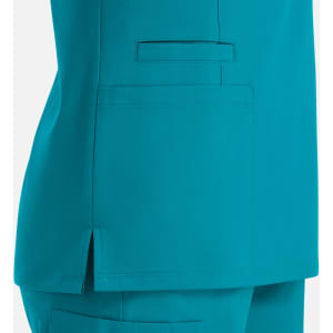 A teal women's double v-neck top featuring a side slit and a pocket. The fabric appears smooth and lightweight.