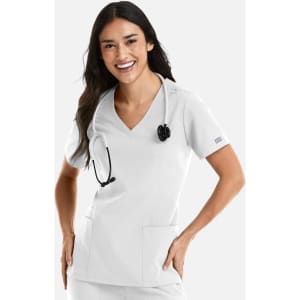 A woman in a white double V-neck top with short sleeves, wearing a stethoscope, and smiling.
