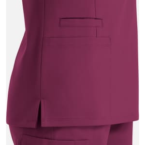 A burgundy women's double V-neck top featuring side slits and a pocket. The image highlights the fabric and cut.