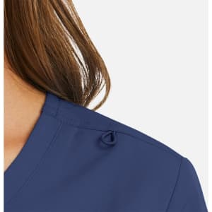 A navy women's mock wrap top with a decorative loop detail on the shoulder.