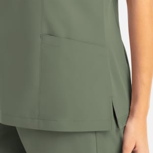 A women's mock wrap top in olive green, featuring a side pocket and a sleek design.