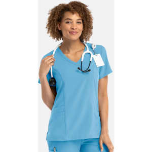 A light blue women's mock wrap top with a V-neckline, featuring a logo and a stethoscope around the neck.