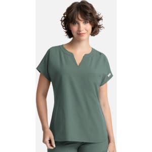 A short-sleeved, green women's top with a V-neck and a small pocket, featuring a logo.