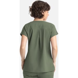 A green women's top featuring short sleeves and three pockets, shown from the back.