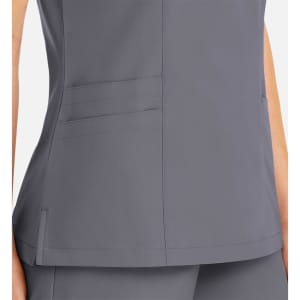A women's mock wrap top in grey with a fitted design and visible pockets. It features a logo on the fabric.