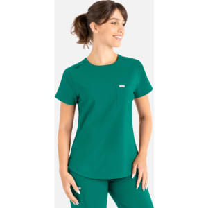 A green scrub top with a round neck, featuring a pocket and a small logo on the chest.