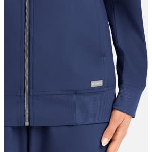 A navy full zip bomber jacket featuring a ribbed hem and cuffs, with a logo detail on the side.
