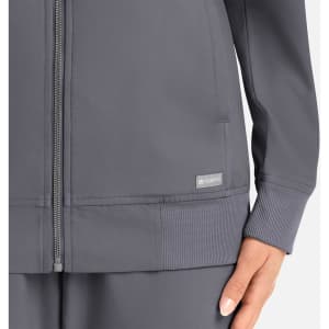 A women's full zip bomber jacket in grey, featuring a textured finish and a small logo on the hem.