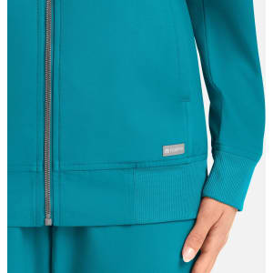 A teal women's full zip bomber jacket featuring a ribbed hem and cuffs, with a small logo on the side.