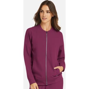 A full zip bomber jacket in vibrant purple, featuring a slim fit and a front pocket. It has a logo on the garment.