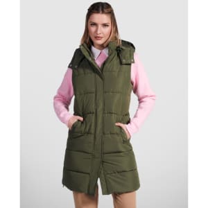 A women's padded vest in olive green, featuring a hood and side pockets, worn over a pink top.