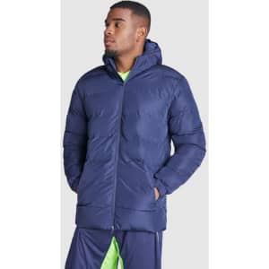 A navy water-repellent parka with a hood, featuring a zip closure and a model wearing sporty attire underneath.