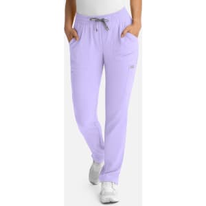 A pair of light purple women's pull-on pants with a drawstring and pockets, featuring a logo.