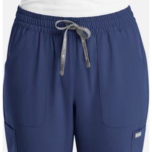 A pair of navy women's full elastic pull-on pants featuring side pockets and a drawstring waistband.