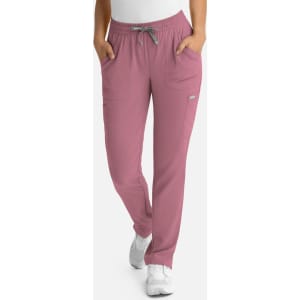 Full elastic pull-on pants in a soft mauve colour, featuring side pockets and a drawstring waistband.