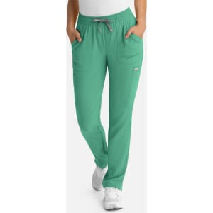 A pair of women's full elastic pull-on pants in a vibrant teal colour, featuring side pockets and a drawstring waist.