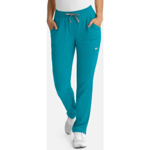 A pair of teal women's pants with a full elastic waistband and side pockets, featuring a logo.