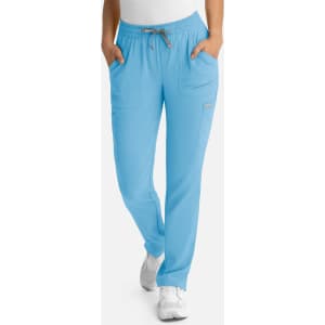 A pair of sky blue women's pants with a full elastic waistband and pockets, featuring a logo.
