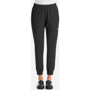 A pair of black women's jogger pants featuring an elastic waistband and pockets, with a logo.
