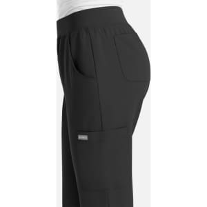Black women's jogger pants with a high waist and side pockets, featuring an additional branding logo.