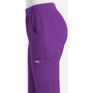 A pair of women's joggers in vibrant purple, featuring side pockets and an elastic waistband.
