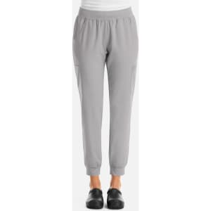 A pair of grey women's joggers with a streamlined design and elastic waistband, featuring side pockets.