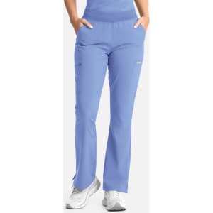 A pair of women's full elastic band flare leg pants in light blue, featuring pockets and a logo.