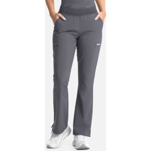 Full elastic band flare leg pants in grey, featuring pockets and a smooth waistband. Includes branding details.