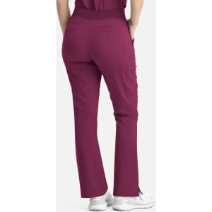 A pair of women's flare leg pants in a rich burgundy colour, featuring a full elastic waistband and back pockets.