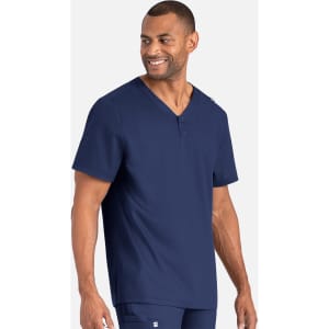 A navy men's tuckable henley top with short sleeves, featuring a buttoned neckline and a logo on the side.