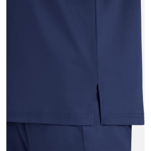 A close-up of a navy blue men's tuckable henley top, showcasing the hem detail and side slit.