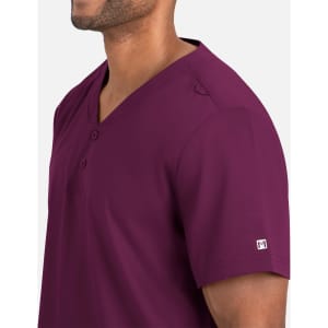 A men's tuckable henley top in a rich burgundy colour, featuring a logo. Side view highlighting the neckline and sleeve.