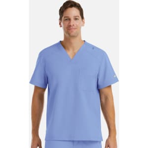 A men's tuckable V-neck top in light blue, featuring a pocket and a logo on the sleeve.