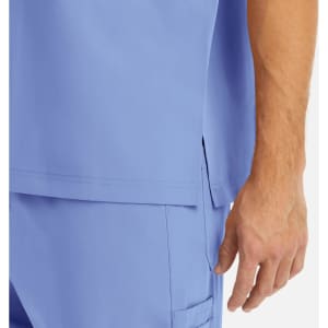 A light blue men's tuckable V-neck top, featuring a side slit and a close-up of the sleeve and hand.