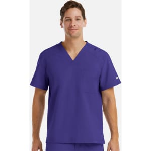 A men's tuckable v-neck top in vibrant purple, featuring a chest pocket and subtle branding.
