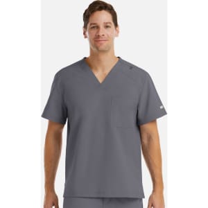 A men's tuckable V-neck top in grey, featuring a front pocket and a logo on the sleeve.