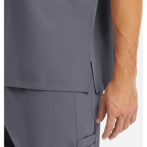 A grey men's tuckable V-neck top, featuring a side split and a close-up of the fabric texture.