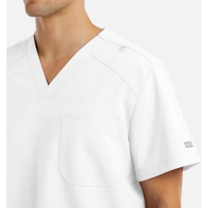 A white V-neck top with tuckable design, featuring a chest pocket and a logo on the sleeve.