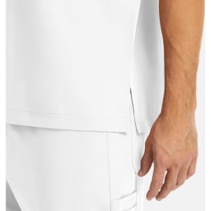 A white men's tuckable V-neck top featuring side slits and a hand on the fabric, showcasing a smooth texture.