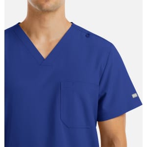 A blue men's V-neck top with four pockets and a logo, featuring a modern fit design.