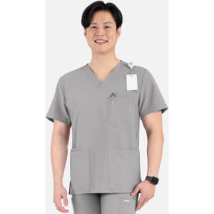 A grey V-neck top with four pockets, worn by a smiling man. The top features a logo and tag.