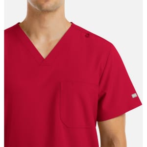 A red v-neck top for men featuring four pockets and a logo on one shoulder.