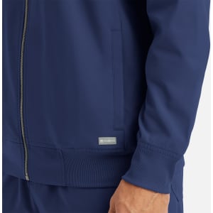 A navy men's full zip bomber jacket featuring a ribbed collar and cuffs, with a logo on the side.