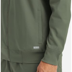 An olive green full zip bomber jacket with a ribbed hem and cuffs, featuring a small logo on the side.