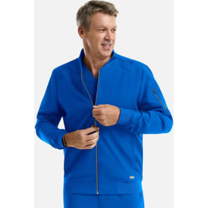 A man wearing a bright blue full zip bomber jacket with a zippered pocket and a logo.