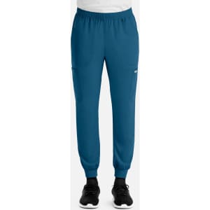 A pair of men's joggers in blue with elastic waistband and cuffs, featuring side pockets and a logo.