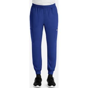 A pair of blue full elastic joggers with pockets and elastic cuffs, featuring a logo on the side.