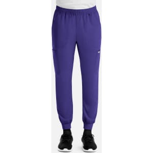 A pair of purple full elastic joggers with pockets and an elastic waistband, featuring a logo.